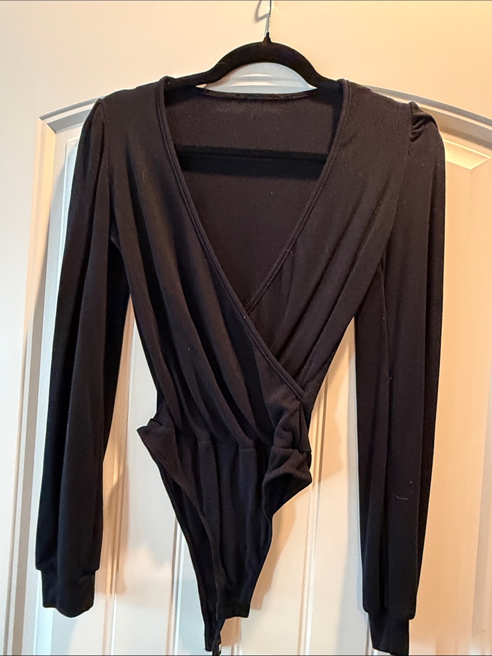 Lulu’s Black Wrap-Style Long Sleeve Bodysuit